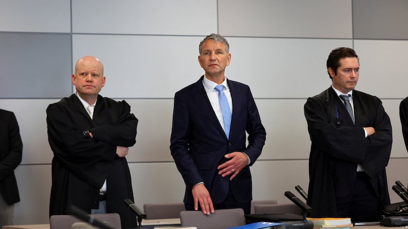 German far-right politician of the Alternative for Germany (AfD) Bjorn Hocke, centre, attends his trial in the state court in Halle, Germany (Fabrizio Bensch/AP)