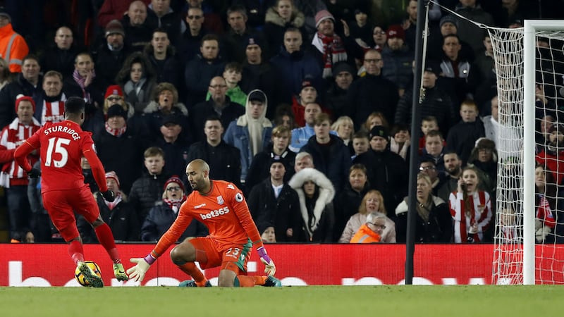 Liverpool's Daniel Sturridge takes the ball around Stoke 'keeper Lee Grant to score at Anfield on Tuesday