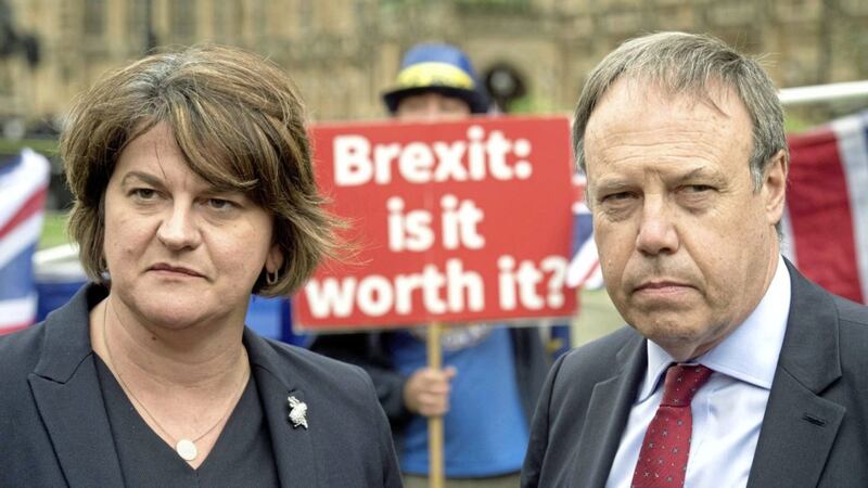 DUP leader Arlene Foster and deputy leader Nigel Dodds in Westminster following a meeting with Prime Minister Theresa May Picture by Stefan Rousseau/PA 