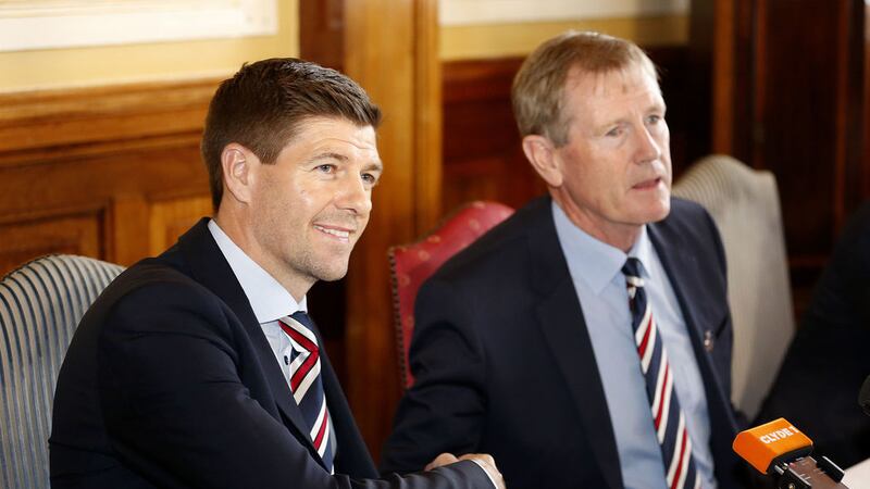 Rangers new manager Steven Gerrard (left) shakes hands with Dave King (right) during a press conference at Ibrox Stadium, Glasgow on Friday May 4, 2018
