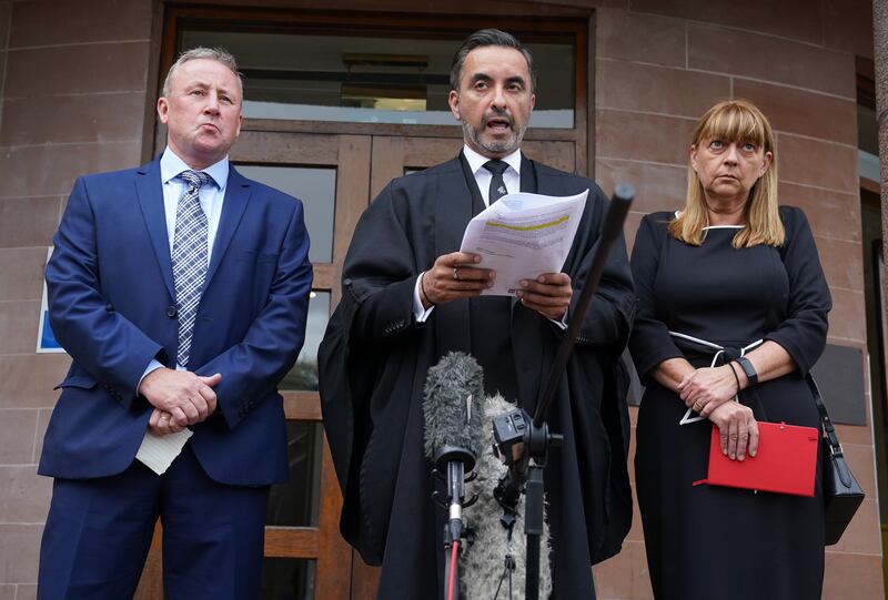 Katie Allan’s parents, Linda and Stuart, pictured with solicitor Aamer Anwar, centre