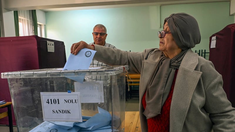 A woman votes at a polling station in Ankara (AP Photo/Ali Unal)