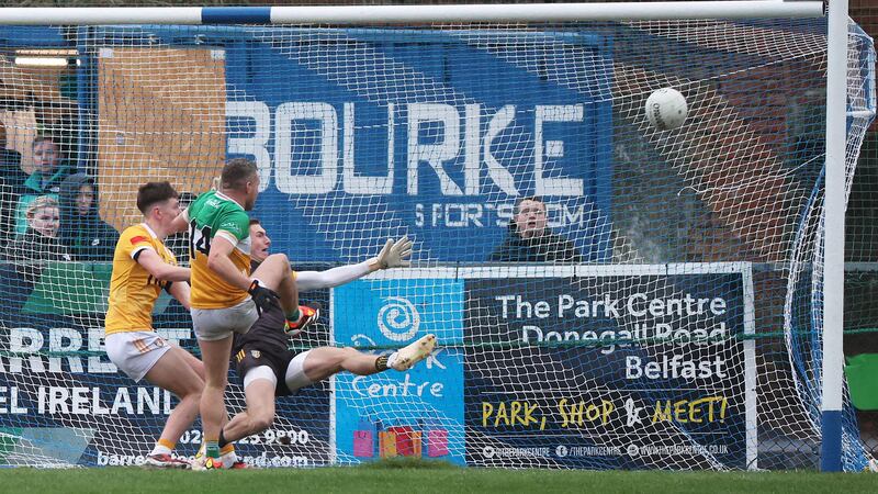 Offaly’s Anton Sullivan scores a goal  during Sunday’s Allianz Football League Division 3 match at Corrigan Park in Belfast.
PICTURE: COLM LENAGHAN