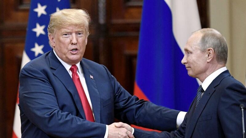 Donald Trump and Vladimir Putin shake hands after a joint press conference at the Presidential Palace in Helsinki, Finland, Monday, July 16, 2018. Picture by Jussi Nukari/Lehtikuva/AP 
