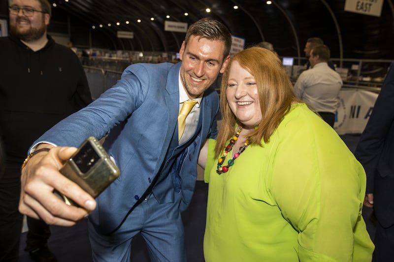 Patrick Brown with Alliance party leader Naomi Long at an election count in Belfast in 2022