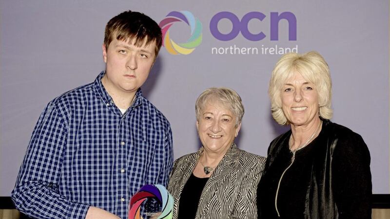 Sam McGarrigle from Belfast Met who won Health &amp; Wellbeing Learner of the Year and the Hilary Sloan MBE Learning Endeavour Award, Kate Fleck, Chair of OCN NI and Sharon Rivers, Head of School for Health, Well-Being and Inclusion at Belfast Met 