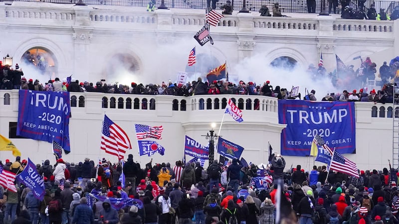 Rioters appear at the US Capitol on January 6, 2021, in Washington (John Minchillo/AP, File)