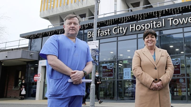 Mark Taylor, Northern Ireland director of The Royal College of Surgeons of England, and Rita Devlin, Northern Ireland director of  The Royal College of Nursing, outside Belfast City Hospital last year. Picture by Hugh Russell 