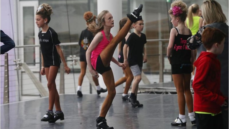 Irish dancers get ready for the All-Ireland Irish Dancing Championships at the Waterfront Hall in Belfast on Monday. Picture by Hugh Russell 