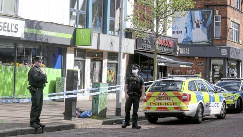 Police cordon off the scene of the attack in Belfast&#39;s Botanic Avenue yesterday afternoon. Picture by Hugh Russell 