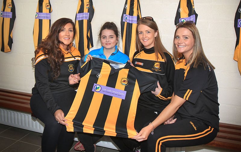 Ballycastle Camogie Club members are presented with new jerseys for the u16 team by Lucia Mee representing the organ donation charity Live Loudly Donate Proudly. Included are from left, Bronagh Donnelly, chair, Ciara McShane, club pro and Clare Scullion, treasurer. Picture Margaret McLaughlin