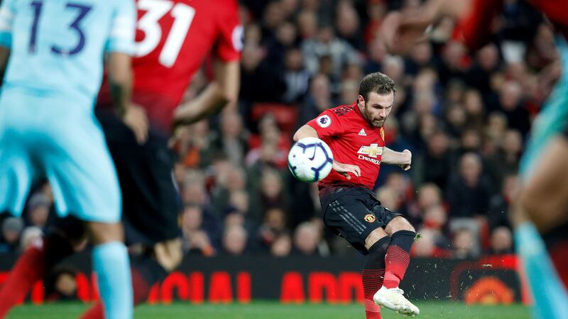 Juan Mata in action for Man Utd - he is set to sign a new deal with the club