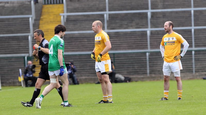 Antrim's Se&aacute;n McVeigh is sent off by referee Maurice Deegan during May's Ulster Senior Championship defeat to Fermanagh at Brewster Park