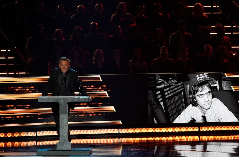 Bruce Springsteen introduces inductee Jimmy Iovine during the Rock & Roll Hall of Fame Induction Ceremony at the Microsoft Theatre in Los Angeles