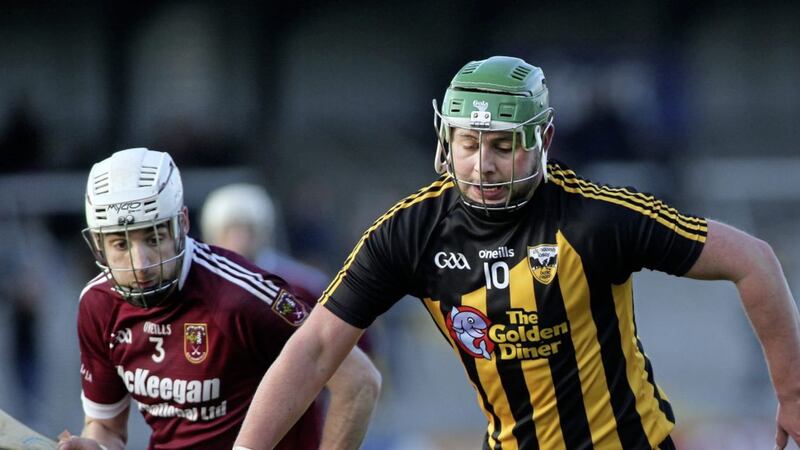 Martin Burke (left) in action in this season&#39;s Ulster final against Ballycran. Picture Seamus Loughran. 