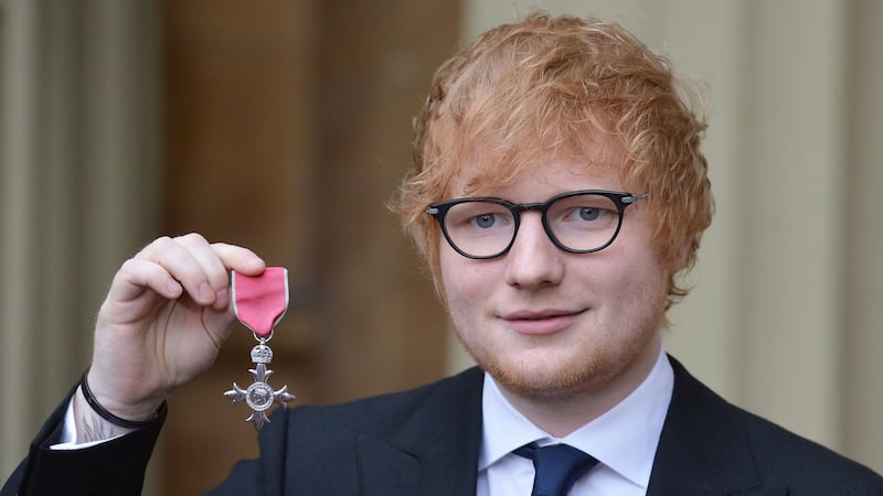 The singer-songwriter was heading off for a celebratory curry after receiving his MBE.