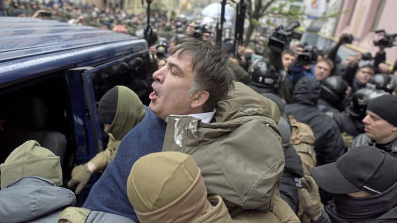 Ukrainian Security Service officers detain Mikheil Saakashvili at his house in Kiev PICTURE: Evgeniy Maloletka/AP 