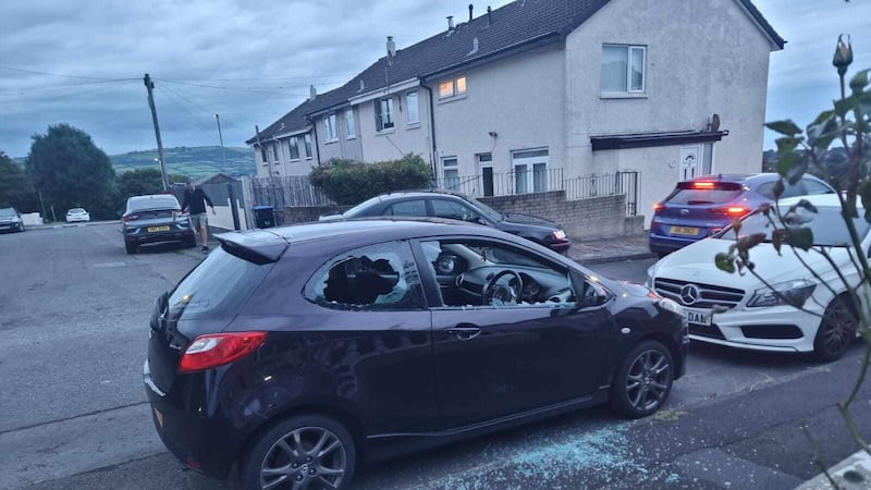 Damage to a car belonging to a Polish couple in Newtownabbey.