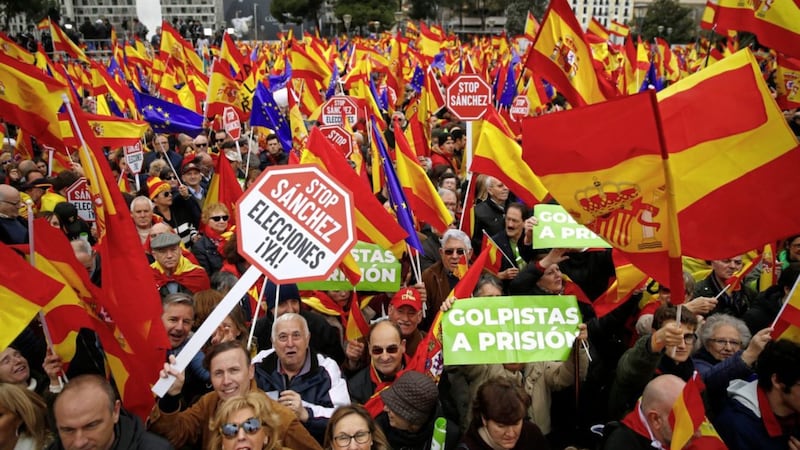 Demonstrators during a protest in Madrid on Sunday. Picture by Andrea Comas/AP 