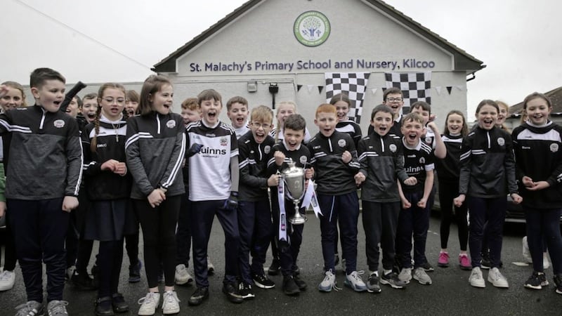 Pupils from St Malachy&#39;s Primary School in Kilcoo, Co Down, are supporting their team ahead of tomorrow&#39;s All-Ireland club final. Picture by Hugh Russell 