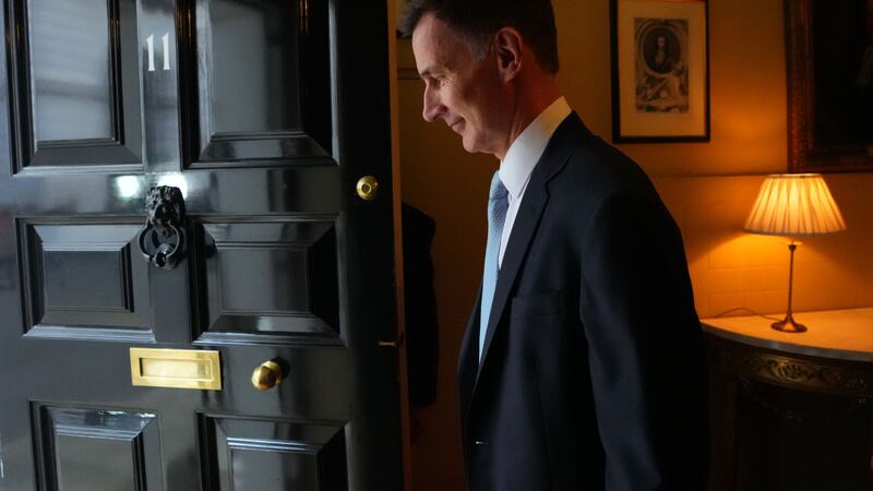 Chancellor of the Exchequer Jeremy Hunt exits 11 Downing Street ahead of delivering his Budget