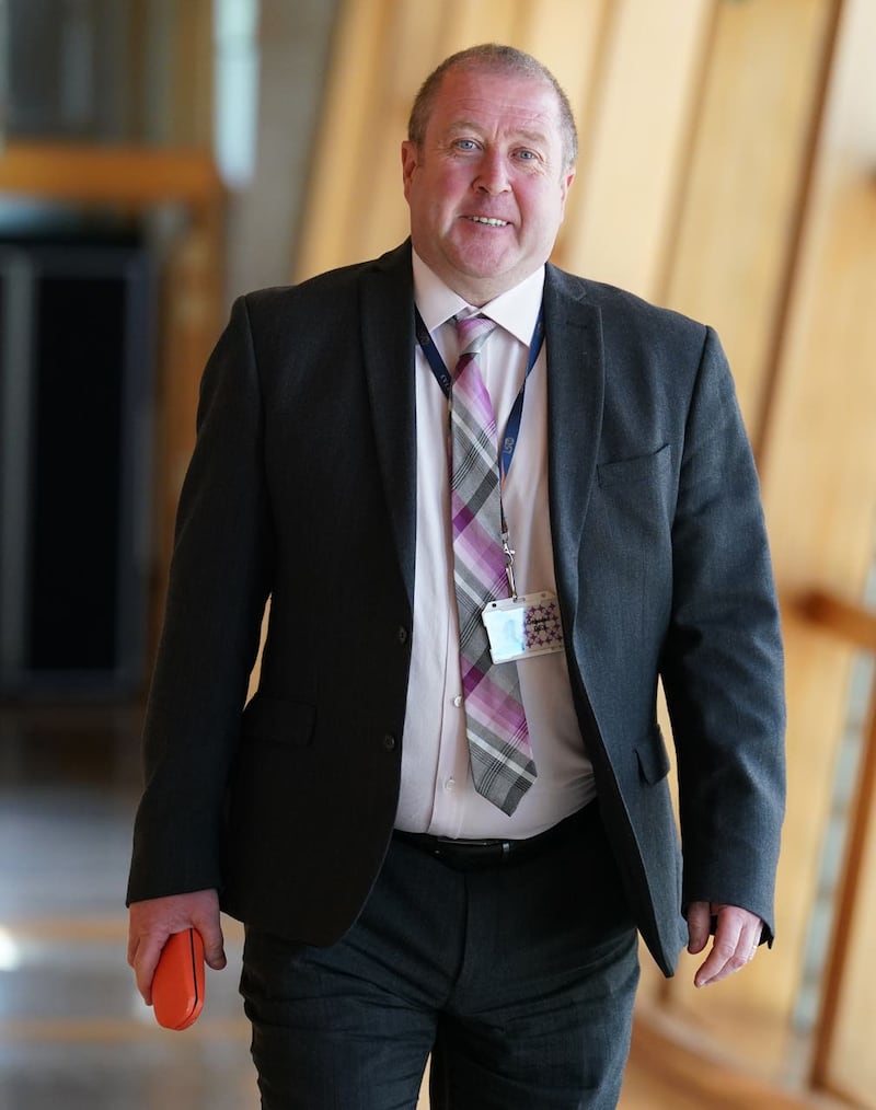 Graeme Dey MSP, pictured in parliament