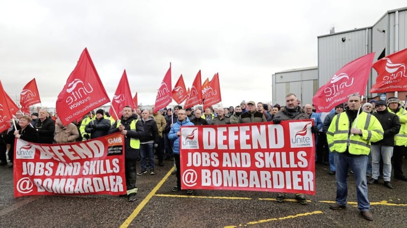 Bombardier workers in Belfast gather for a rally at the factory gates. Photo: Niall Carson/PA Wire 
