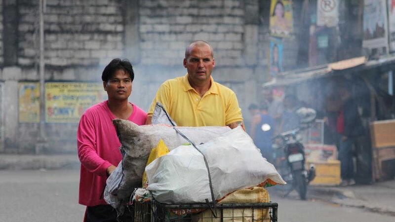 Mark Crosbie and Mel Macaraeg complete the rubbish row in Manila 