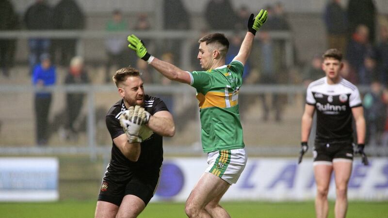 Niall Kane clears the danger in last year&#39;s clash with Glen at the Athletic Grounds. Picture Seamus Loughran. 