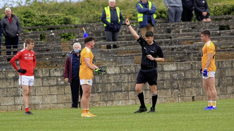 Ryan Murray gets his marching orders seconds after winning it for Antrim Picture: Seamus Loughran. 