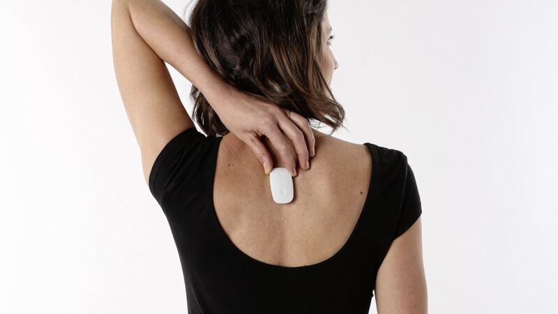 The Upright Go is placed on your back where it monitors your posture throughout the day 