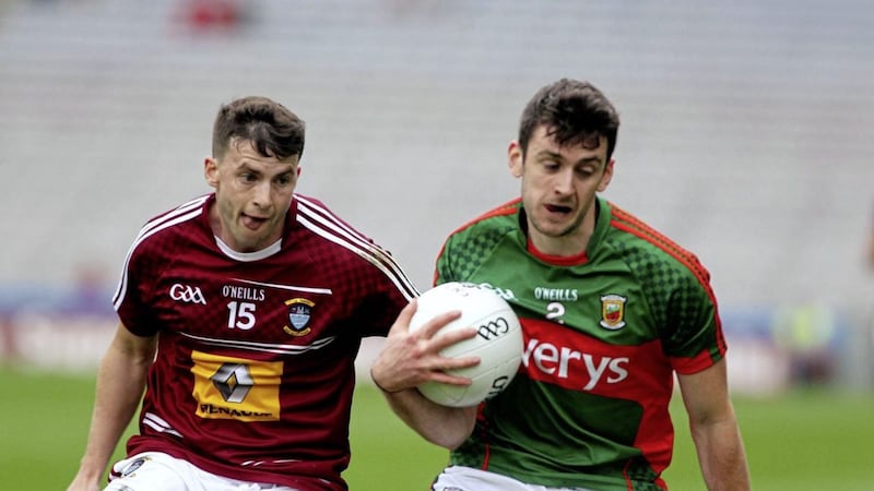 John Connellan (left) during his playing days with Westmeath. Now retired, he has taken on a public role of trying to pressurise the GAA into rebalancing its games development funding. Picture by Seamus Loughran 