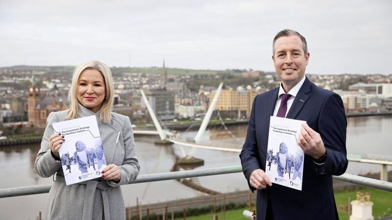 First Minister Paul Givan and deputy First Minister Michelle O&rsquo;Neill with the new draft investment strategy setting out the Executive&rsquo;s priorities for the next 30 years. Picture: Kelvin Boyes / Press Eye 
