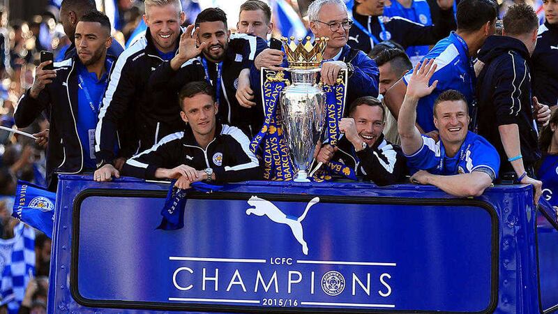 Leicester City&#39;s team celebrate during an open top bus parade through Leicester City Centre. Picture by Nigel French, Press Association              