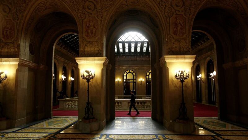 A man walks through the Parliament of Catalonia in Barcelona, Spain, Monday. Picture by Manu Fernandez, Associated Press 