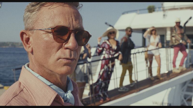 Daniel Craig will walk the red carpet alongside film-maker Rian Johnson.