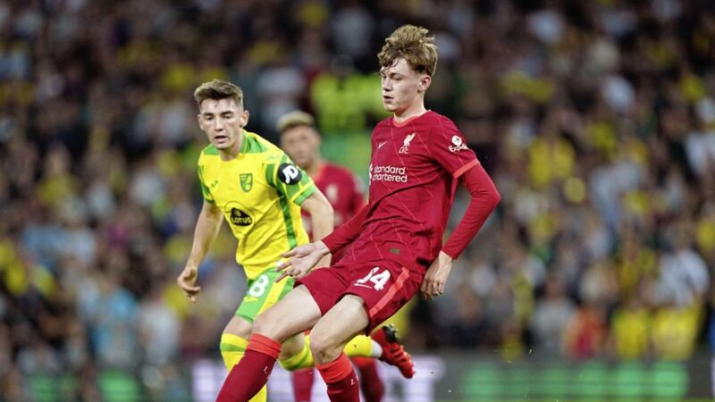 Conor Bradley (right) during his competitive senior debut for Liverpool in the Carabao Cup away to Norwich City. 