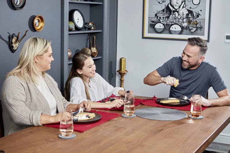 Chef Dean Edwards, with his daughter Indie and fianc&eacute;e Liz. He says family mealtimes are an opportunity for meaningful conversation. Picture by Vodafone/PA 