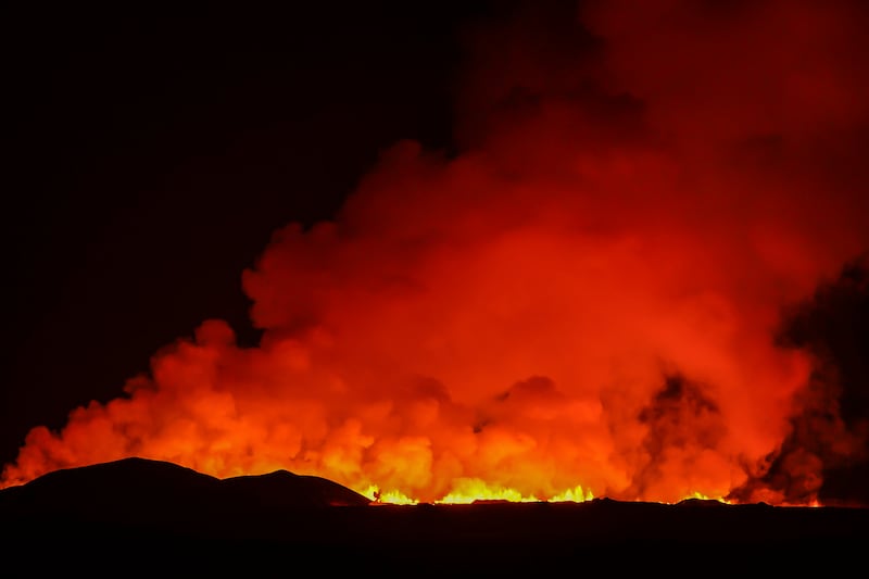 A volcano erupting north of Grindavik (Marco Di Marco/AP)