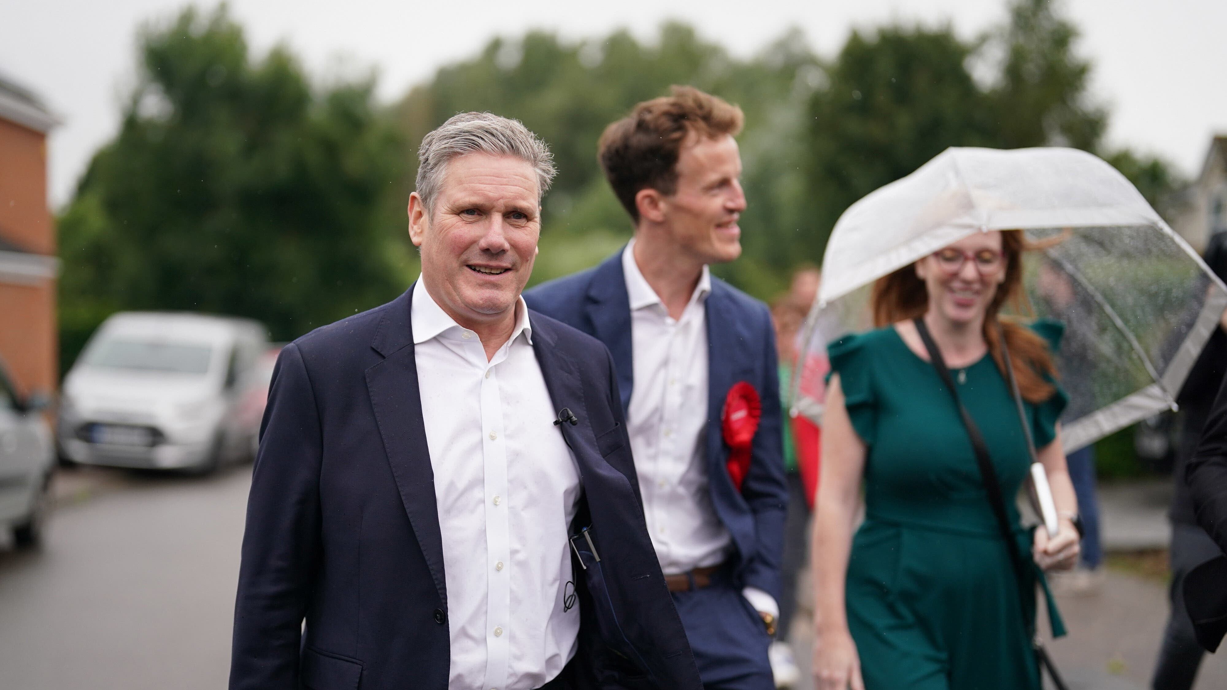Labour leader Sir Keir Starmer and deputy leader Angela Rayner with Alistair Strathern, a would-be MP who took part in a Greenpeace protest (Jacob King/PA)