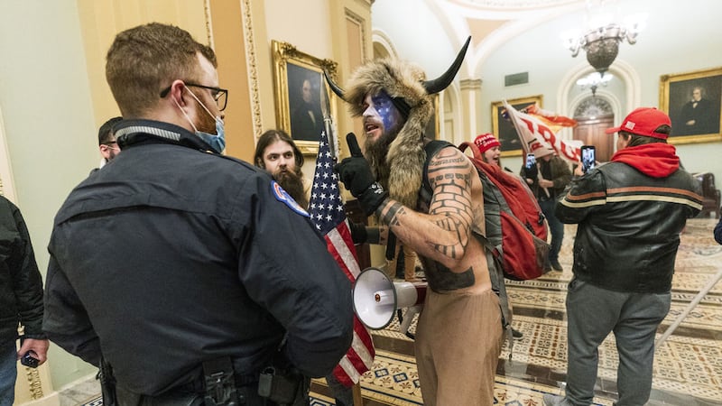 Supporters of President Donald Trump are confronted by US Capitol Police officers outside the Senate Chamber inside the Capitol, Wednesday, January 6, 2021 in Washington. Picture by AP/Manuel Balce Ceneta&nbsp;