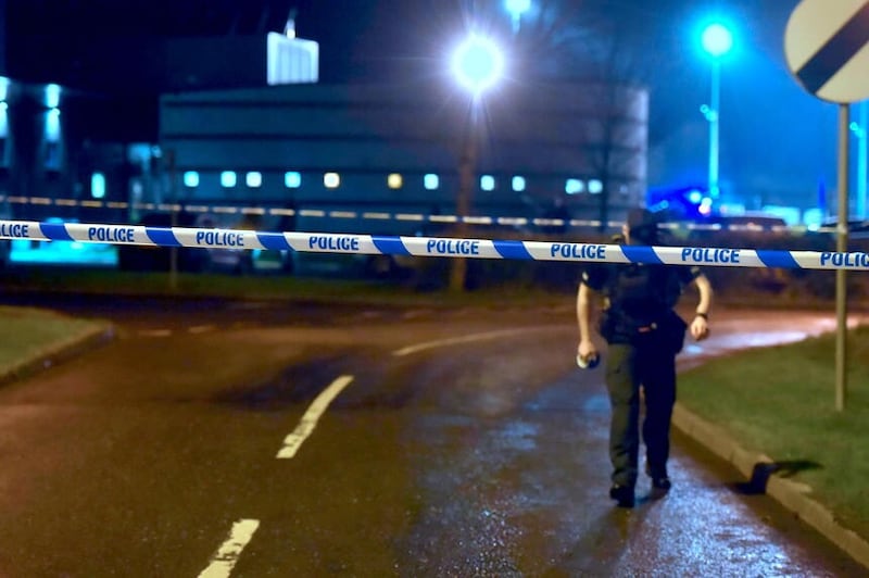 PSNI officers at the scene of a shooting in the Killyclogher Road area of Omagh, where a man, a serving police officer, was injured in a shooting incident at a sports complex in Omagh on Wednesday evening. (Oliver McVeigh/PA)
