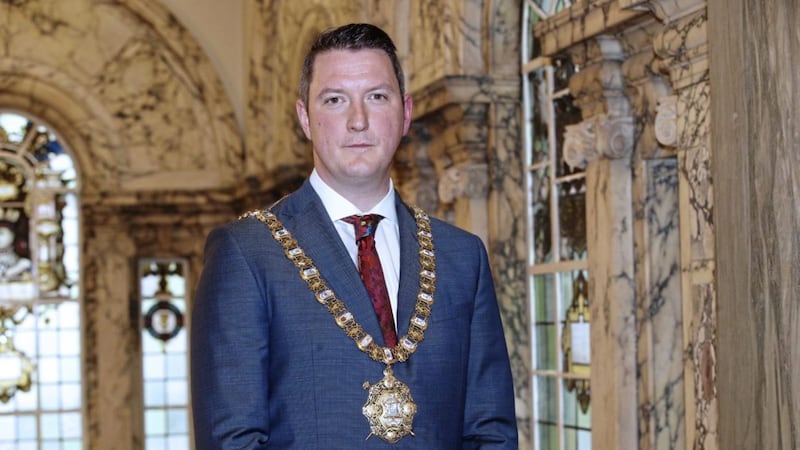 Newly-elected Sinn F&eacute;in councillor John Finucane as the new lord mayor of Belfast on the way out to meet the press at Belfast City Hall Pcture by Hugh Russell 
