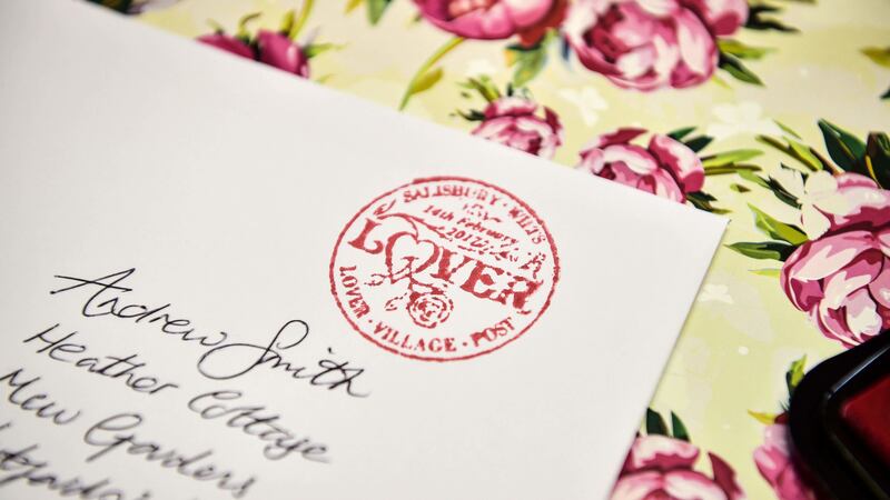 Volunteer cupids in the village of Lover will be hand-stamping cards from home this year.