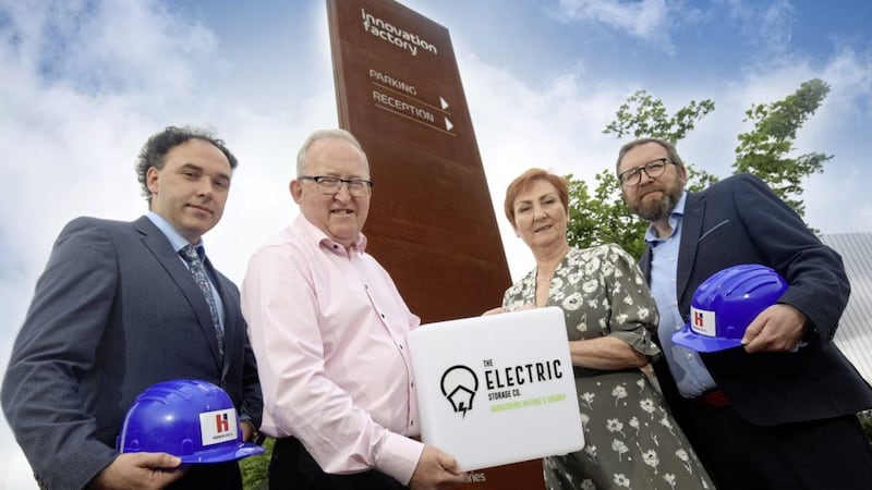 L-R: Damien O&rsquo;Callaghan, Heron Bros; Eddie McGoldrick and Anne Marie McGoldrick from TESC and Emmet Heron, Heron Bros, as TESC&#39;s offices in the Innovation Factory in west Belfast. 