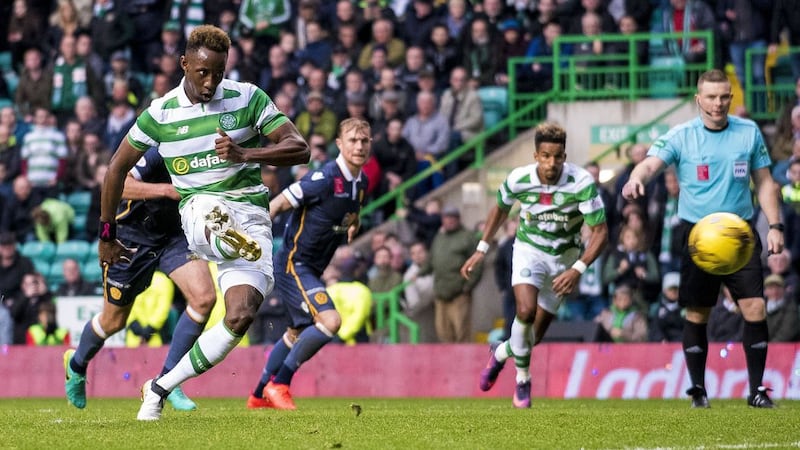 Celtic's Moussa Dembele scores his side's second goal of the game from the penalty spot during the Ladbrokes Scottish Premiership match at Celtic Park&nbsp;