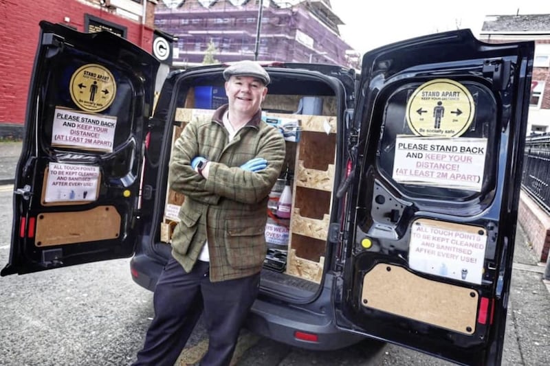 Seamas Delaney, head chef at Hatfield House on the Ormeau Road in south Belfast, with the bar's Guinness delivery van