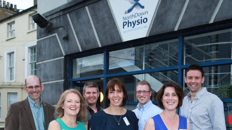 Julia Webster, front centre, and some of her team celebrate the opening of North Down Physio&rsquo;s new premises 