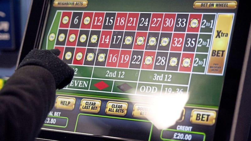 The maximum stake on fixed odds betting terminals is to be reduced to &pound;2 in April but the change will not apply to the north. Picture by Daniel Hambury, Press Association 