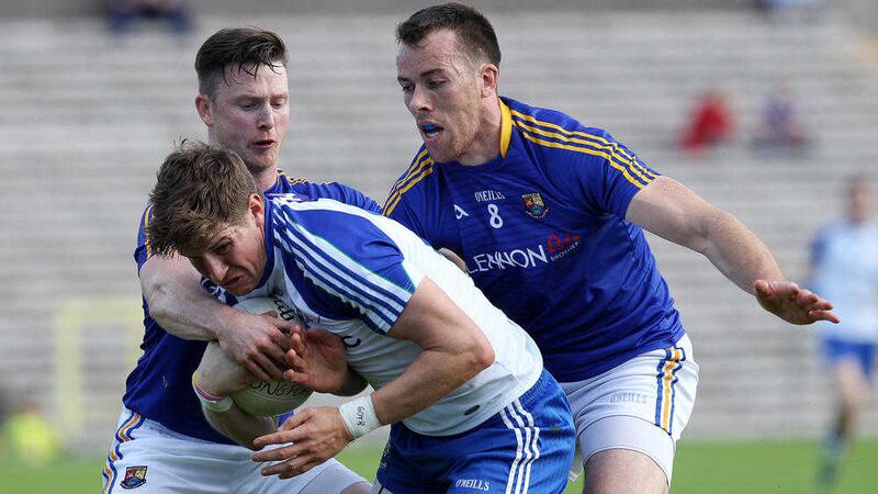 Monaghan Darren Hughes is put under pressure by Longford&rsquo;s Michael Brady and Donal McElligott during last Saturday&rsquo;s All-Ireland SFC Qualifier in Clones															         Picture by Philip Walsh